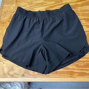 Black Avia dry wicking running shorts with built in bike liner